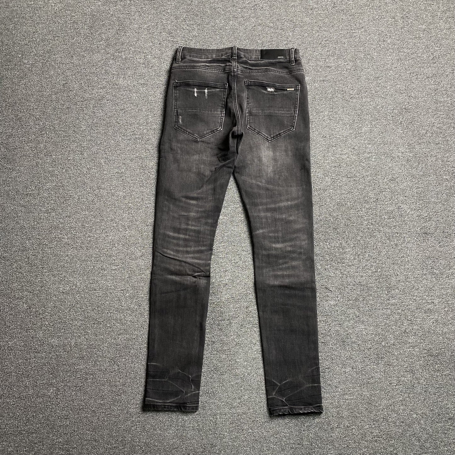 AMIRI SLASH SLIM JEANS