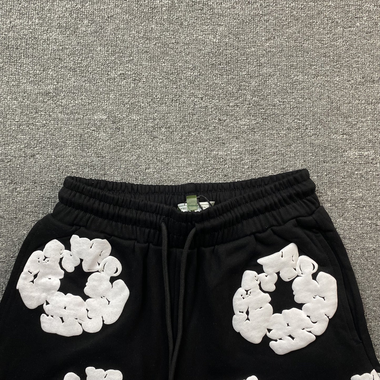 DENIM TEARS COTTON WREATH SHORTS BLACK