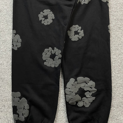 DENIM TEARS COTTON WREATH SWEATPANTS MONOCHROME BLACK