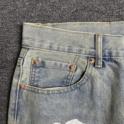 DENIM TEARS x LEVI'S DIRTY WASH WREATH JEANS LIGHT WASH