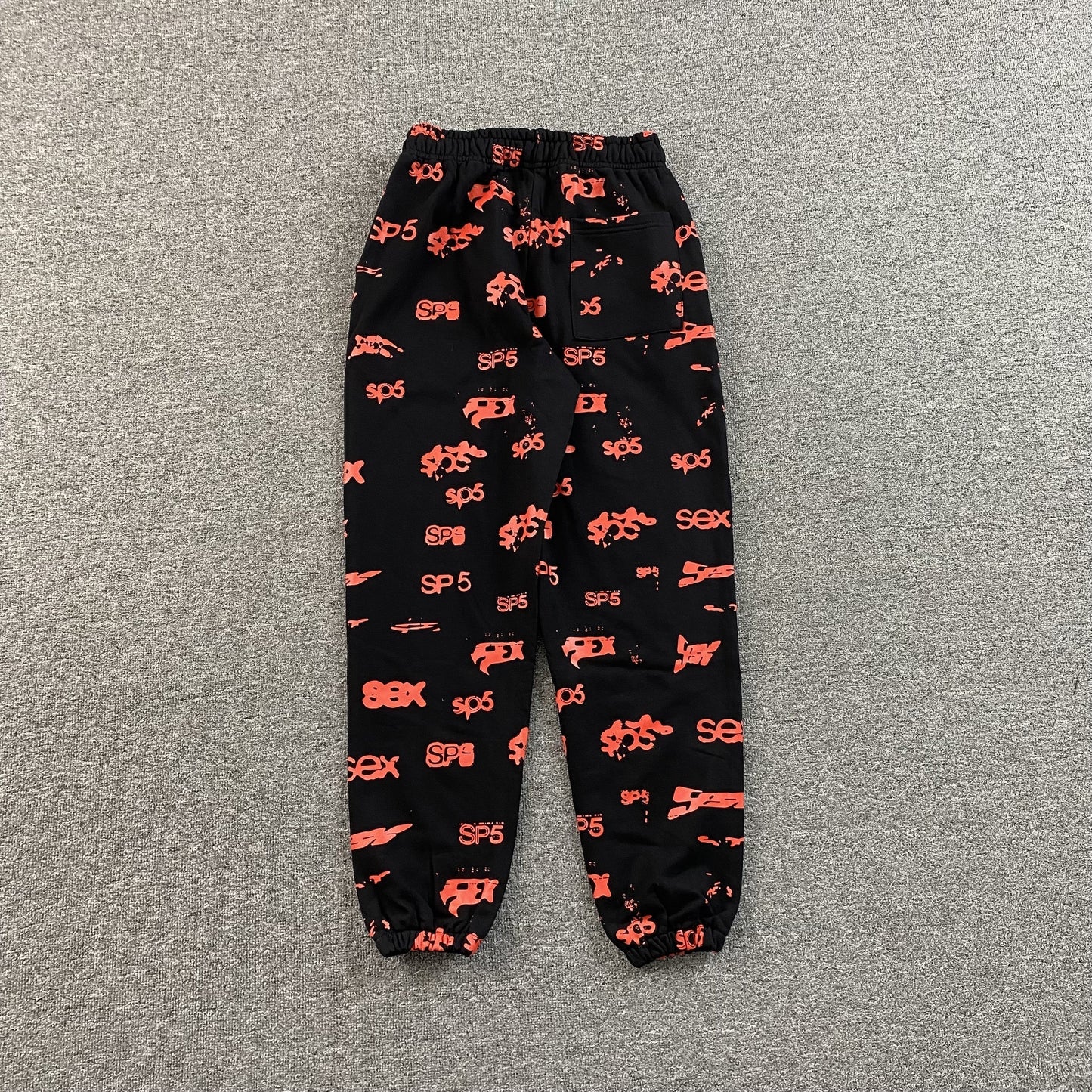 SP5DER SEX AOP SWEATPANTS BLACK