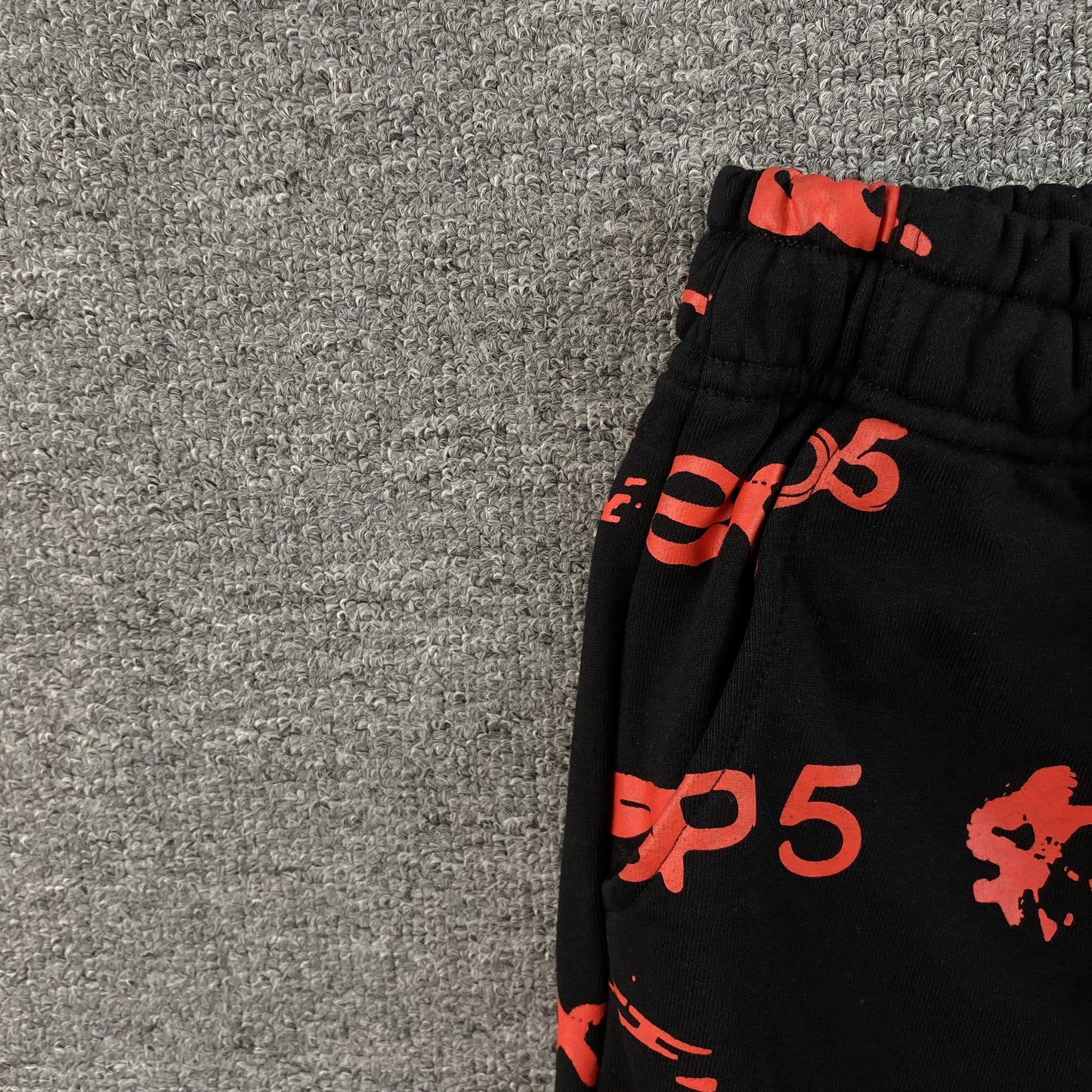 SP5DER SEX AOP SWEATPANTS BLACK